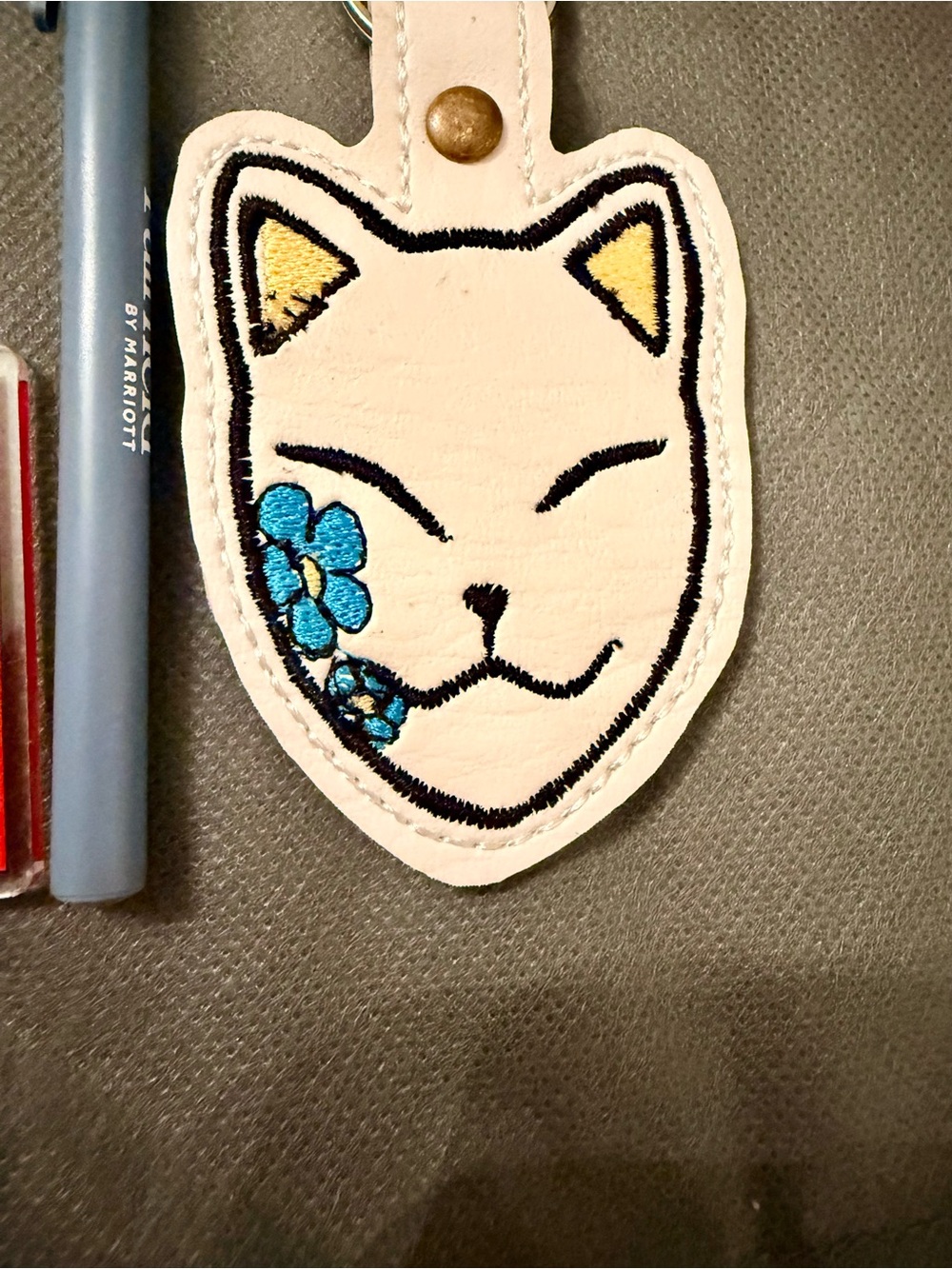 White Cat Face Keychain Charm with Blue Flower Embroidery